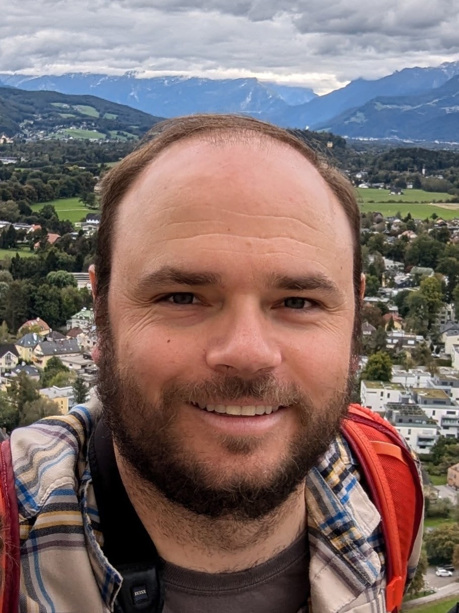a headshot of Brian